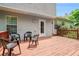 Large back deck with chairs, offering plenty of room for outdoor entertaining at 734 Kilkenny Cir, Lithonia, GA 30058