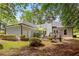 Expansive backyard featuring mature trees, outdoor living space and well maintained lawn at 836 Palmetto Tyrone Rd, Sharpsburg, GA 30277