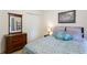 Inviting bedroom with a comfortable bed, matching dresser, and soothing colors at 836 Palmetto Tyrone Rd, Sharpsburg, GA 30277