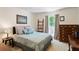 Serene bedroom with soft decor, comfortable bed, and a window providing natural light at 836 Palmetto Tyrone Rd, Sharpsburg, GA 30277