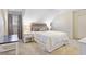 Inviting bedroom featuring a comfortable bed, a window, and a side table at 836 Palmetto Tyrone Rd, Sharpsburg, GA 30277