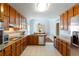 Spacious eat-in kitchen with stainless steel appliances and granite countertops at 836 Palmetto Tyrone Rd, Sharpsburg, GA 30277