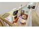 Open living room features a fireplace, large windows, and a ceiling fan at 836 Palmetto Tyrone Rd, Sharpsburg, GA 30277