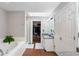 Bright main bathroom with dual sinks, a soaking tub, a walk-in closet, and a separate shower at 836 Palmetto Tyrone Rd, Sharpsburg, GA 30277