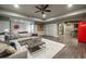 Finished basement with ample seating, a pool table, bar area, and a Coca-Cola themed refrigerator at 1849 Rock Springs Ne Ln, Atlanta, GA 30324