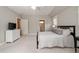 A Primary bedroom featuring neutral paint, carpeted floors, and an en-suite bathroom at 1849 Rock Springs Ne Ln, Atlanta, GA 30324