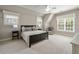 A cozy bedroom with neutral color scheme, carpeted floors, and lots of natural light at 1849 Rock Springs Ne Ln, Atlanta, GA 30324
