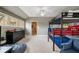 Bunk bed room with high ceilings and large windows providing natural light at 1849 Rock Springs Ne Ln, Atlanta, GA 30324