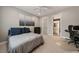 Comfortable bedroom with carpet, large bed, and a bathroom and office space at 1849 Rock Springs Ne Ln, Atlanta, GA 30324