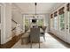 Open dining room featuring hardwood floors and open view into the living room at 1849 Rock Springs Ne Ln, Atlanta, GA 30324