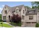 Attractive brick home with a two-car garage and manicured landscaping at 1849 Rock Springs Ne Ln, Atlanta, GA 30324