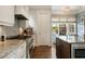 Modern kitchen with stainless steel appliances and center island at 1849 Rock Springs Ne Ln, Atlanta, GA 30324