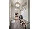 Functional mudroom featuring built-in shelving, hooks, a bench, and storage baskets at 1849 Rock Springs Ne Ln, Atlanta, GA 30324