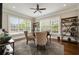 Bright office space with large windows, hardwood floors, and ceiling fan at 1849 Rock Springs Ne Ln, Atlanta, GA 30324