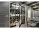 Climate-controlled wine cellar with custom racks and glass doors for showcasing your collection at 1849 Rock Springs Ne Ln, Atlanta, GA 30324