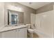 Bright bathroom features granite counters, ample storage, and shower-tub combo at 2154 Marne Nw Gln, Kennesaw, GA 30152