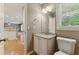 Cozy bathroom featuring granite countertops and ample natural light at 2154 Marne Nw Gln, Kennesaw, GA 30152