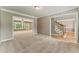 Spacious living room features plush carpeting, and ample natural light at 2154 Marne Nw Gln, Kennesaw, GA 30152