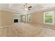 Expansive living room featuring a fireplace and lots of natural light at 2154 Marne Nw Gln, Kennesaw, GA 30152