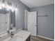 Bright bathroom showcasing a tub, modern fixtures, and stylish flooring at 2401 Phillips Rd, Lithonia, GA 30058
