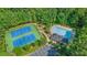 Community amenities featuring tennis courts, playground, parking, and a swimming pool surrounded by trees at 2455 Ivey Oaks Rd, Cumming, GA 30041