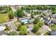 An aerial shot of the neighborhood shows a community pool, trees, and well-maintained homes at 556 Poplar Bnd, Canton, GA 30114