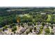 Community aerial view showing the home's location within a tree-lined neighborhood at 556 Poplar Bnd, Canton, GA 30114
