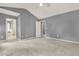 Bedroom with vaulted ceiling, carpet, and access to bathroom at 556 Poplar Bnd, Canton, GA 30114