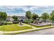 Exterior shot of community playground, picnic tables, pool and other amenities, landscaped with greenery and trees at 556 Poplar Bnd, Canton, GA 30114