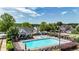 Wide angle view of the Community Pool, surrounding buildings and landscaping on a beautiful sunny day at 556 Poplar Bnd, Canton, GA 30114