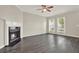 Inviting living room featuring a fireplace and plenty of natural light at 556 Poplar Bnd, Canton, GA 30114