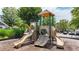 The community playground has three slides and climbing areas with a mulch base at 556 Poplar Bnd, Canton, GA 30114
