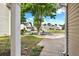 Neighborhood street featuring well-maintained homes, grassy lawns, and mature shade trees at 556 Poplar Bnd, Canton, GA 30114