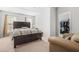 Spacious bedroom features carpet, neutral paint and plenty of natural light at 1622 Honeysuckle Path, Conyers, GA 30012