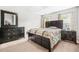 Modern bedroom with dark furniture at 1622 Honeysuckle Path, Conyers, GA 30012