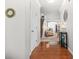 Inviting foyer with gleaming hardwood floors, elegant decor, and seamless access to the living areas at 1622 Honeysuckle Path, Conyers, GA 30012