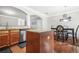Kitchen with a center island and dining area at 1622 Honeysuckle Path, Conyers, GA 30012