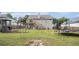 Expansive backyard featuring play equipment and ample green space at 251 Hunt Club Cir, Temple, GA 30179