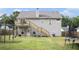 Spacious backyard featuring a deck, and stairs leading to the yard at 251 Hunt Club Cir, Temple, GA 30179