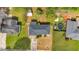 Aerial view of home with dark grey roof, green grass, and an above ground pool in the backyard at 2664 Olive Springs Se Rd, Marietta, GA 30060