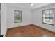 Bedroom with hardwood floors and windows offering natural light at 2664 Olive Springs Se Rd, Marietta, GA 30060