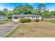 Charming single-story home featuring a well-maintained yard and a classic design with a cozy front porch at 2664 Olive Springs Se Rd, Marietta, GA 30060