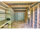 Interior shot of shed area with wood framing and corrugated metal walls and shelving on left at 2664 Olive Springs Se Rd, Marietta, GA 30060