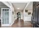 Inviting foyer with hardwood floors and views into the living spaces at 321 Woodbrook Crst, Canton, GA 30114