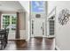 Welcoming foyer with soaring ceilings and natural light offers a grand entrance at 321 Woodbrook Crst, Canton, GA 30114