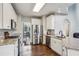 Well-equipped kitchen with stainless steel appliances and granite countertops at 321 Woodbrook Crst, Canton, GA 30114