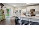 Bright kitchen features granite countertops, stainless steel appliances and white cabinetry at 321 Woodbrook Crst, Canton, GA 30114