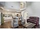 Open floor plan connecting the living room, kitchen, and dining area at 321 Woodbrook Crst, Canton, GA 30114