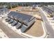 New townhome community featuring traditional architecture, garages, sidewalks and a pool area at 867 Pensive Run, Dacula, GA 30019