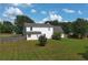 Spacious backyard featuring a well-maintained lawn and privacy fence at 1012 Gloria Grand Blvd, Mcdonough, GA 30252